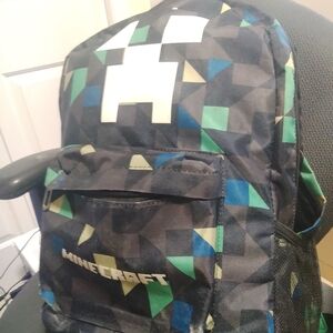 Modern Black and Blue Geometric Backpack